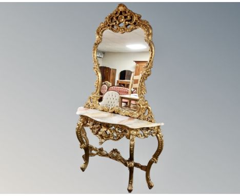 An ornate Venetian style gilt and onyx topped console table with matching mirror.