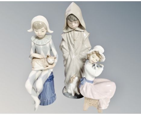 Three Nao figures of girls and boy with animals (3)