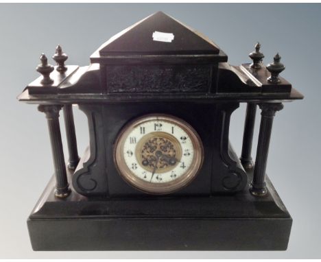A 19th century black slate mantel clock.