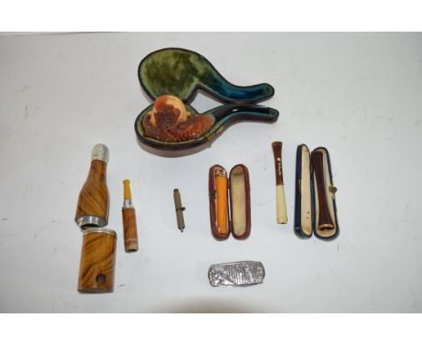 Quantity of pipes, one in original leather case with carved wooden bowl and carved shell type lobster with black stem, togeth
