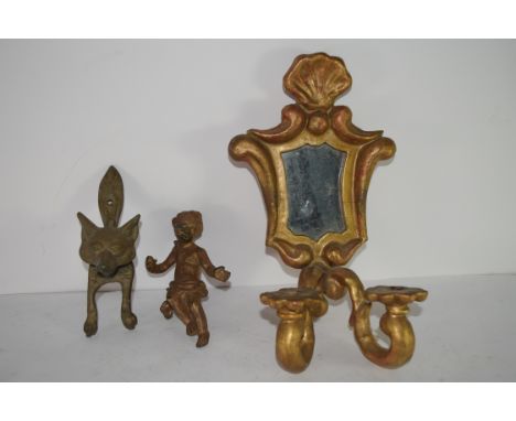 Brass door knocker, modelled as a fox's head, together with a small gilt mirror and candelabra, and a bronzed metal cherub (3