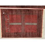 Carpets & Rugs: Early 20th cent. Turkman rug, unusual two rectangular central panels in blues,