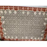Carpets & Rugs: Oriental carpet, grey ground with red border, stylised floral decoration, all in