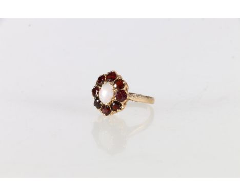 9ct gold opal and garnet set dress ring, size K, 3.6 grams 