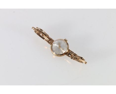 9ct gold lady's Zenith wristwatch, having subsidiary second hand.  It winds and runs. Bracelet is 9ct, gross 17.9 grams.