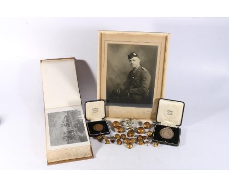 Items related to Corporal Paddy Carey of the Highland Light Infantry to include a silver metal Highland Light Infantry medal 