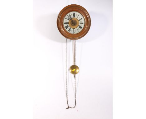 Antique 'postman's alarm' clock, the circular mahogany case having dial with Roman numeral chapter ring, the case interior be