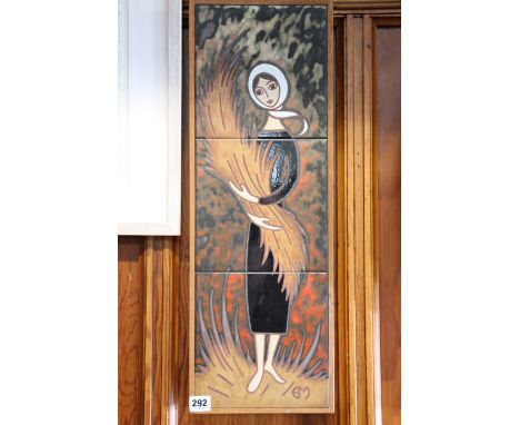1960's style tile triptych panel depicting a lady with harvest, signed with 'EM' monogram, 61cm x 22cm.&nbsp; 