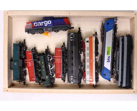 A collection of nine unboxed N gauge locos, from various outlines, and manufacturers, including a Trix class 31, a Graham Far