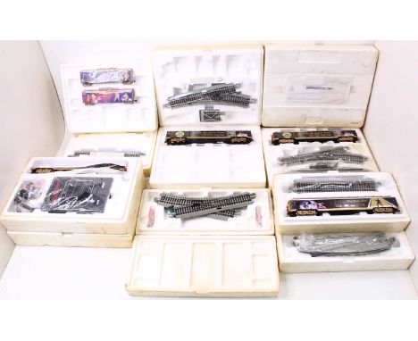 A collection of Bachmann Elvis Presley commemorative 00 gauge locos, coaches and wagons, originally American outline, to incl