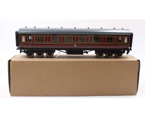 Darstaed 12-wheeled sleeping car LMS Period II 10548, maroon with yellow/black lining, grey roof, with internal lighting. Ex-