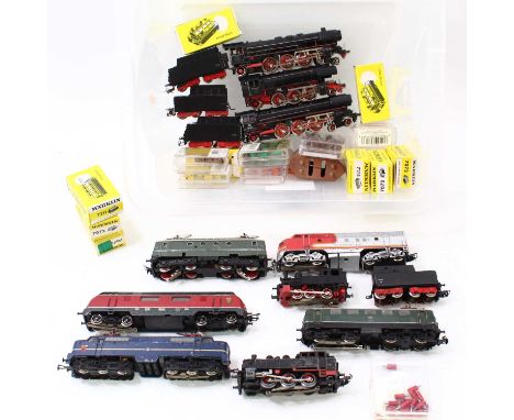 A group of 10 unboxed 3 rail Marklin HO gauge locos, including, two 4-6-0 steam locos, a 2-6-2 steam loco, no.23014, a Santa 
