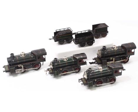 Four KBN 0-4-0 clockwork locos but only three tenders. Dark green lined red &amp; light green. One loco is missing a smokebox