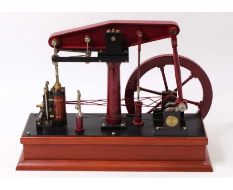 A stationary beam engine, believed to be scratch-built, comprising a single cylinder, a 10-inch beam, and a 7.5-inch flywheel