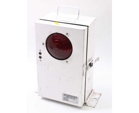 A modern issue buffer stop lamp in white, manufactured by Lamp Manufacturing &amp; Railway Supplies LTD, in Dorking, England,