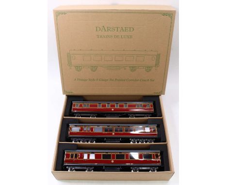 Darstaed set of 3, 0-gauge corridor bogie coaches. Manufacturer's stock. LMS Period II comprising kitchen car No.262; 12 whee