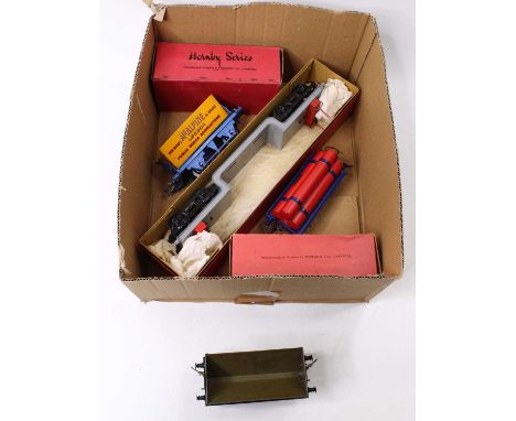 Four Hornby pre-war goods wagons: 1939-41 trolley wagon, grey base, black bogies, red bolsters, almost no marks (E) (BNM); 19