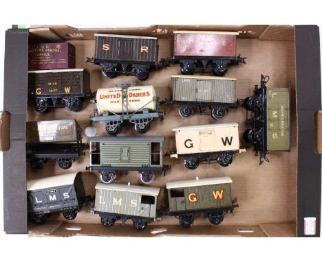 Tray containing 10 Hornby 4-wheel mainly pre-war wagons, including UD Milk tank &amp; SR goods van. Most require small amount