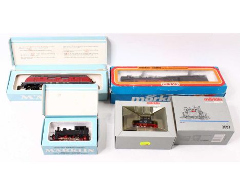 Four Marklin HO gauge locos to include a BR 98 class in DB black, a 3 rail 0-6-0 shunter, in black, a 3 rail V200 in red and 