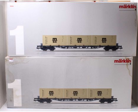 Two Marklin Gauge 1 container wagons, item no. 58708, in original boxes, with three 20ft MSC containers in each box. Wagons a
