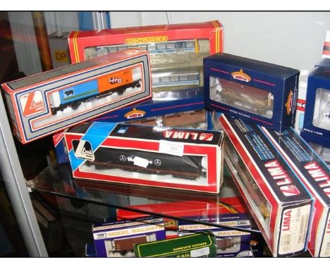 Selection of boxed Lima and Bachmann rolling stock and other 