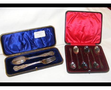 Silver knife and fork in presentation case, together with a set of six silver teaspoons 