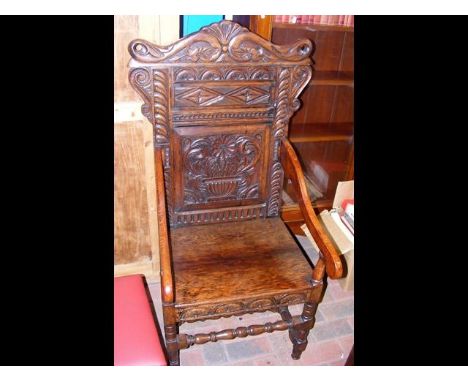 A Victorian carved Wainscot chair 