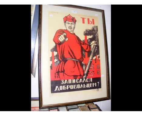 A Russian propaganda poster depicting a man in red tunic CONDITION REPORTlooks like an original print