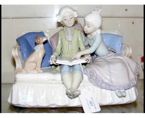 A Lladro figural group of boy, girl and dog on settee - 26cmCONDITION REPORTgood condition