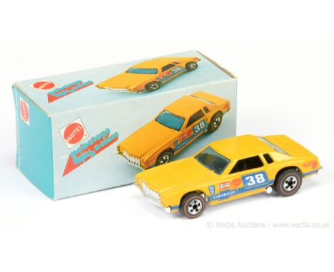 Hot Wheels (Mattel) - Redline - 7660 "Monte Carlo Stocker" - finished in yellow, blue tinted windows, red, white and blue rac