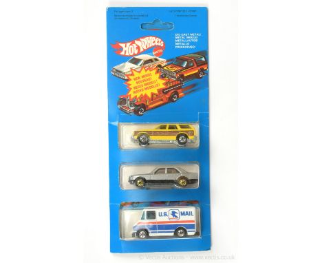 Hot Wheels (Mattel) 3-piece set to include 3258 Aries Wagon - yellow body with wood effect side panels; 3261 Mercedes 380SEL 