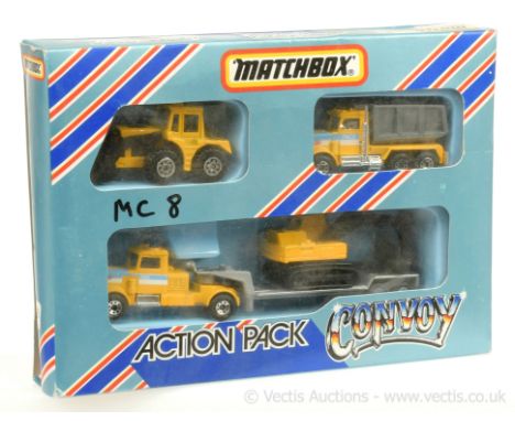 Matchbox CY203 (Action Pack / Convoy) 3-piece Set to include Peterbilt Low Loader - yellow, silver with Excavator load; also 
