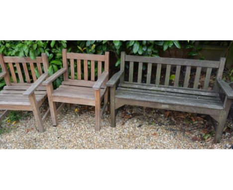 A Teak Garden Bench together with a pair of similar armchairs