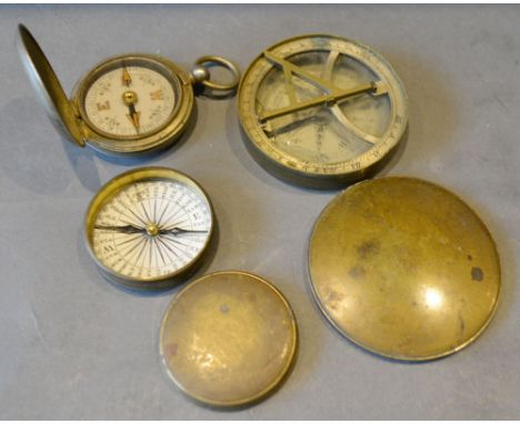 A Military Compass inscribed Terrasse W. Co. dated 1918 together with two other brass cased compasses