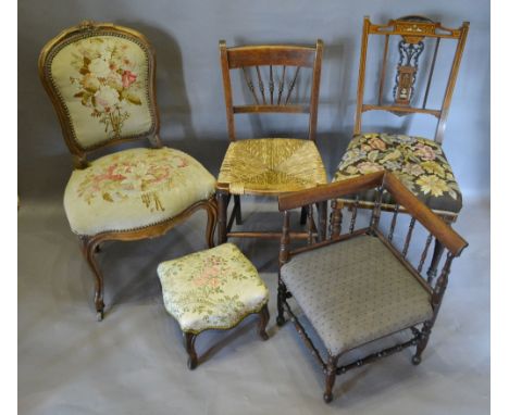 An Edwardian Rosewood Marquetry Inlaid Drawing Room Side Chair with a carved splat back above a tapestry seat raised upon tur