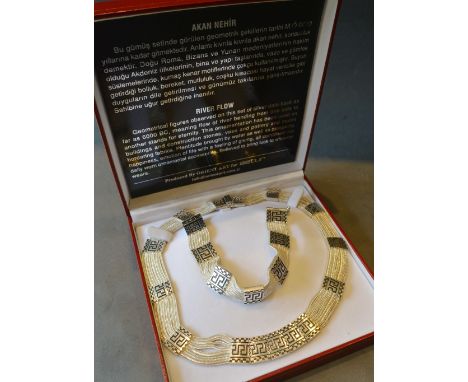 A 925 Silver Multi Chain Necklace together with a Matching Bracelet by Oriental Art for Setur