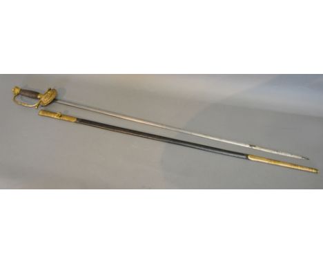 A Victorian English Court Sword, the engraved blade inscribed Thomas and Coles, Leamington, the brass hilt with crown pommel 