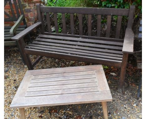 A Teak Garden Bench with Slatted Seat and Square Legs with Stretcher, together with a low teak garden table