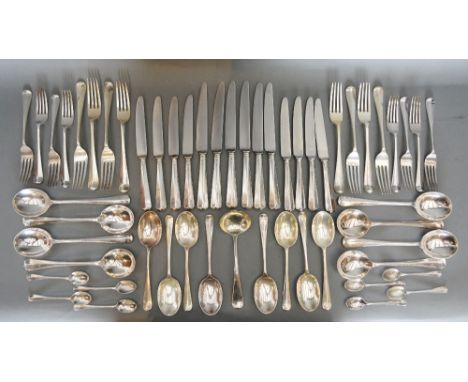 A 20th Century London Silver Rat Tail Canteen of Cutlery, comprising eight dinner forks, eight dessert forks, eight soup spoo