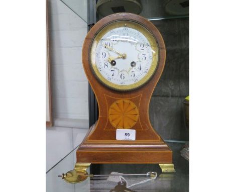 An Edwardian inlaid mahogany balloon mantel clock, the case with central patera, on brass ogee feet, the enamel dial painted 