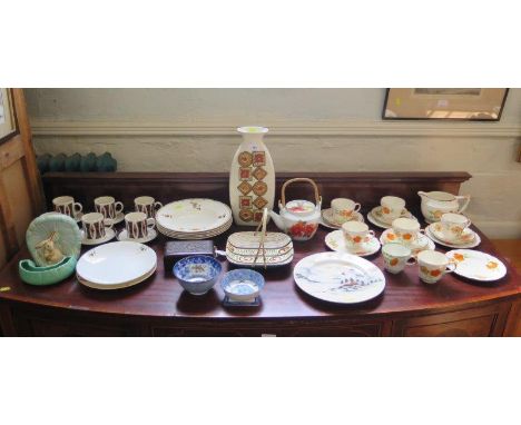 Six Keele St. Pottery 'Indus' tea cups and saucers, a 1950s Brentleigh Ware vase, a handpainted floral part tea service, Sylv