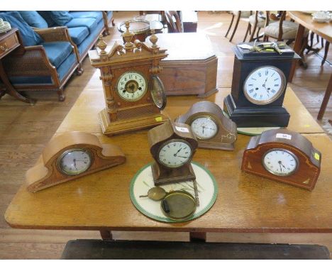 Four Edwardian inlaid desk timepieces, a mid Victorian slate mantel clock and another mantel clock (6) 