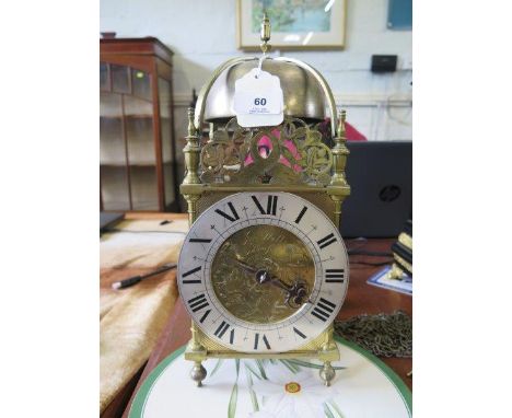 An 18th century brass lantern clock, the rose engraved dial inscribed John Watts Stamford, with silvered chapter ring, dolphi