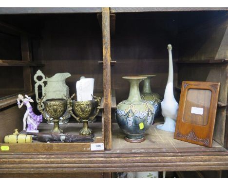 A pair of Royal Doulton green glaze vases, 21.5 cm high, Nao figures of a goose and dove, a Charles Meigh 'York Minster' Jug,