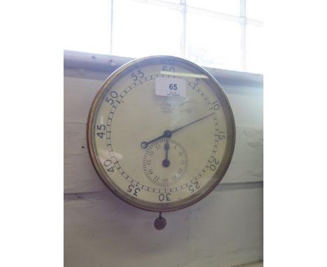 A Dent of London wall mounted timer, with brass bevel, the dial numbered 64999, 18.5cm diameter 