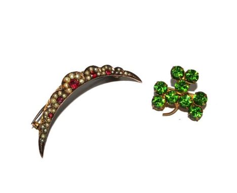 A pearl and ruby crescent brooch and clover brooch