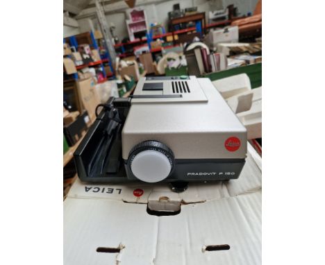 A Leica P150 slide projector with trays.  