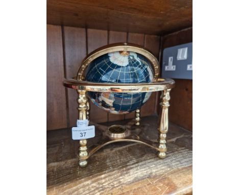 A multi-gem set terrestrial globe  