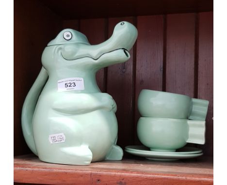 Carlton Ware ‘Crocodile’ teapot with two teacups and saucers  No chips, cracks or evidence of previous repair
