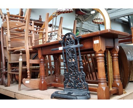 A mixed lot comprising aged oak side table/stool, two cane seat bedroom chairs, cast iron umbrella/stick stand and an adjusta